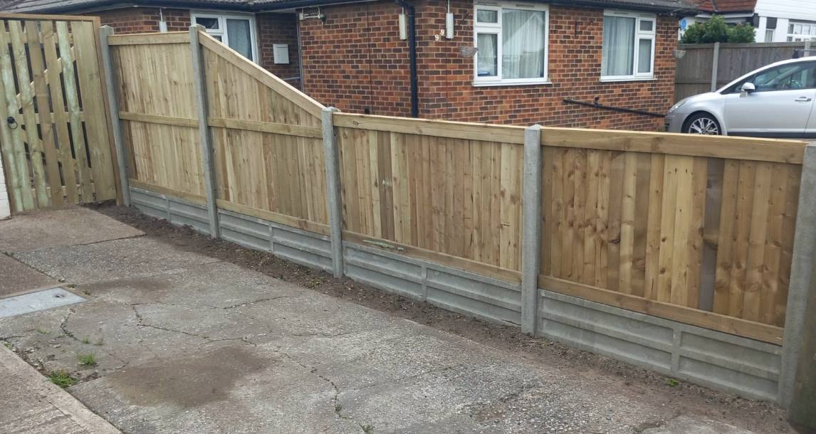 Stepped closeboard fencing along a driveway in Kent