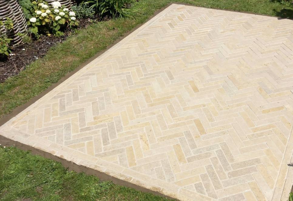Finished herringbone cobble patio by Lawn Ranger Landscapes