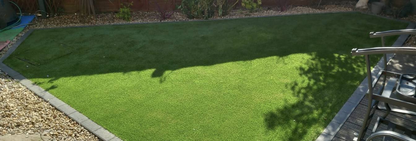 Wide finished lawn with gravel border