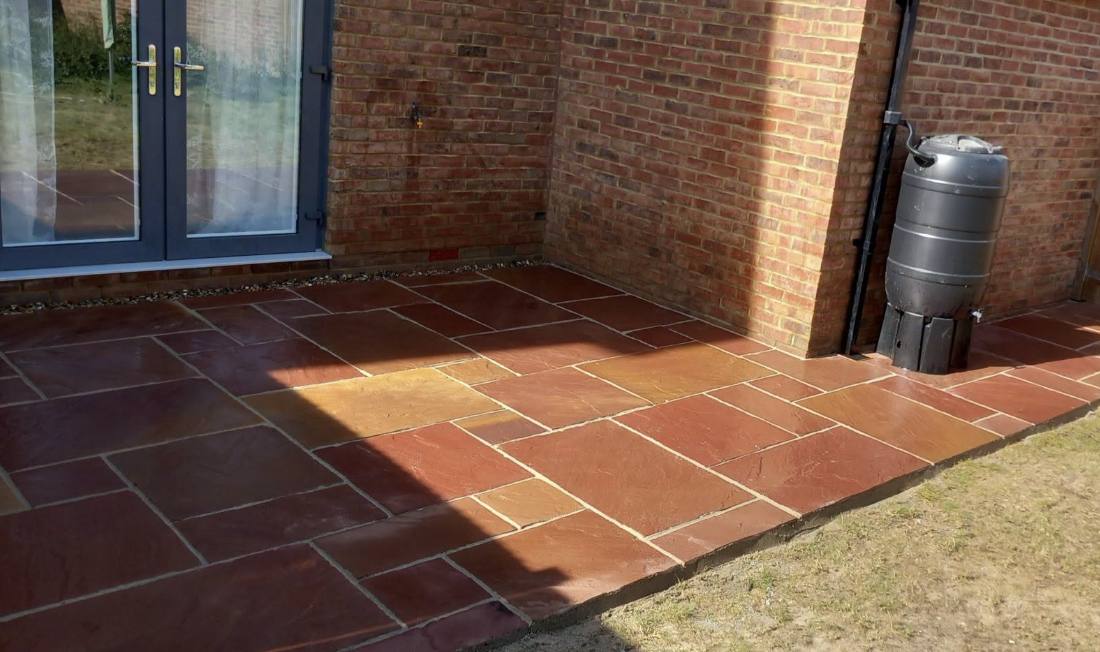New lawn and sandstone patio in Folkestone