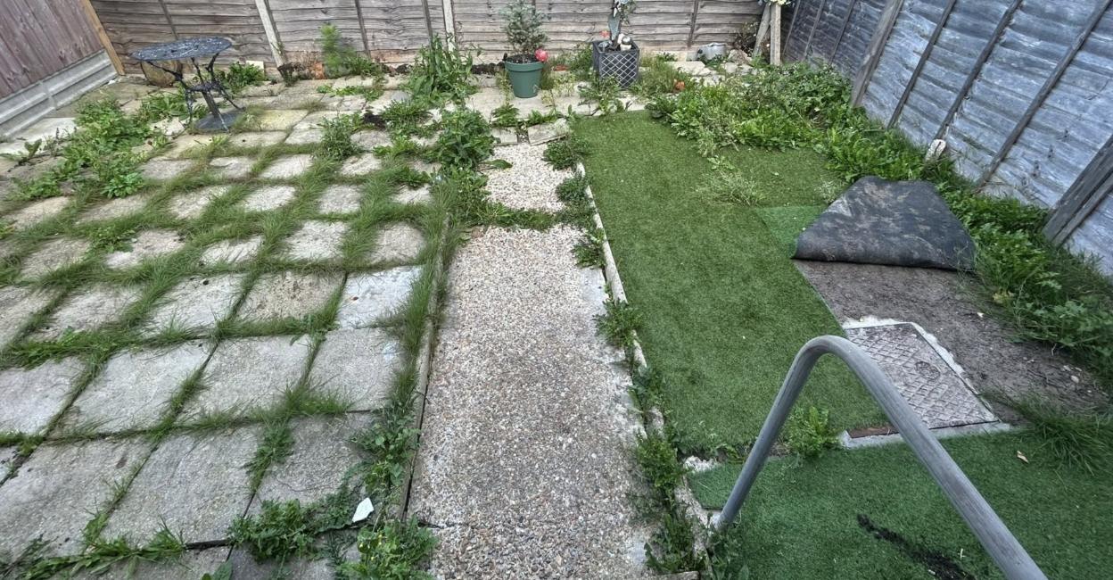 Landscaped garden with sandstone patio and new lawn