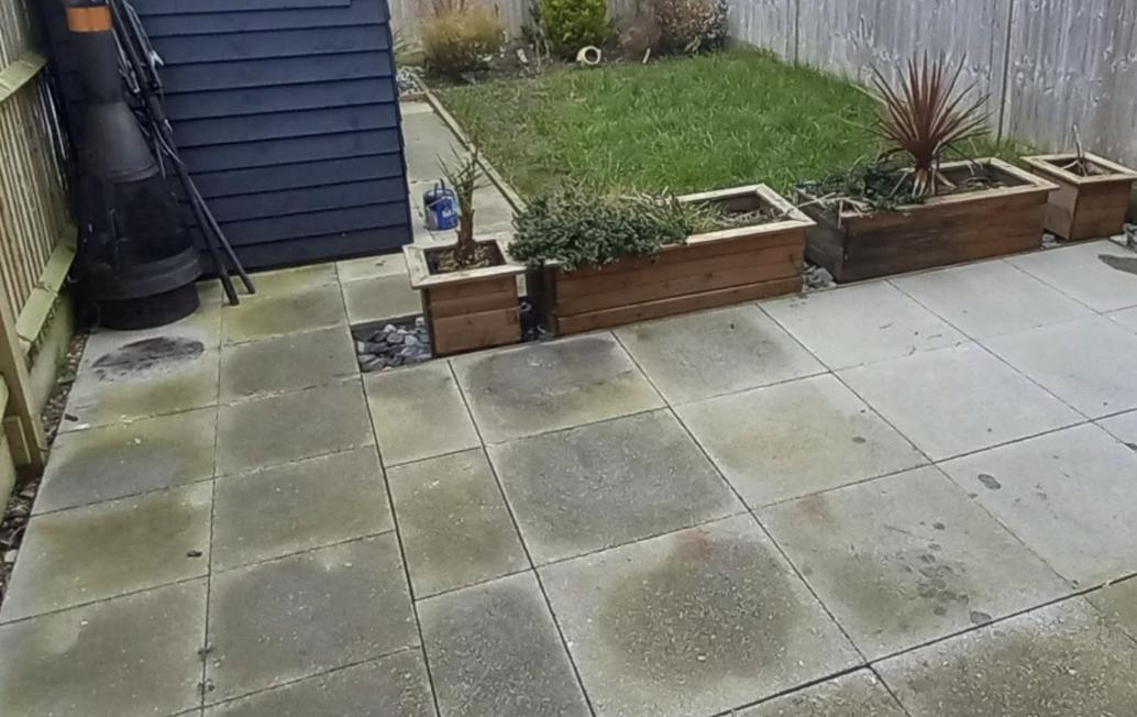 Tired patchy garden before new turf in Kent